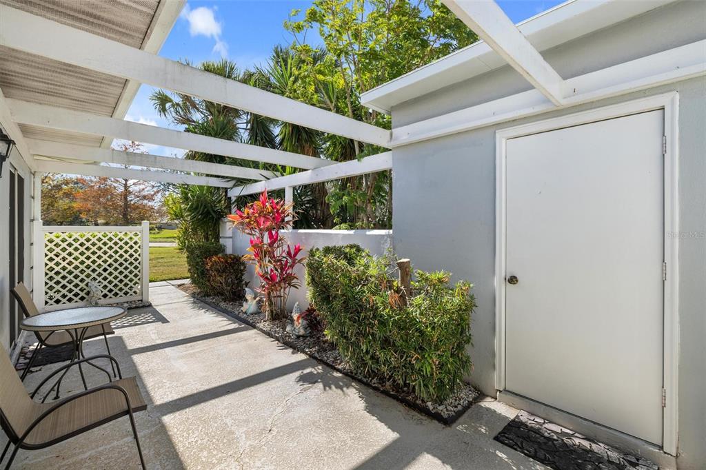 276 Cerromar Way South, Unit 60 Venice, FL 34293 - Photo 4 of 31 a view of a porch