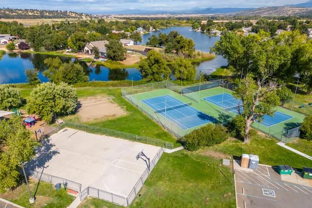 an aerial view of a house with a garden