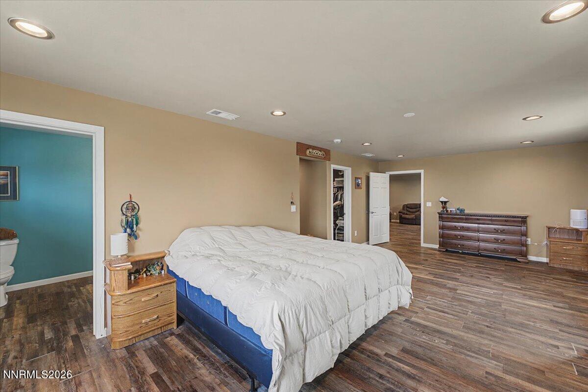 2300 Temple Hill Road Reno, NV 89521 - Photo 12 of 63 a bedroom with a bed and a view of bathroom