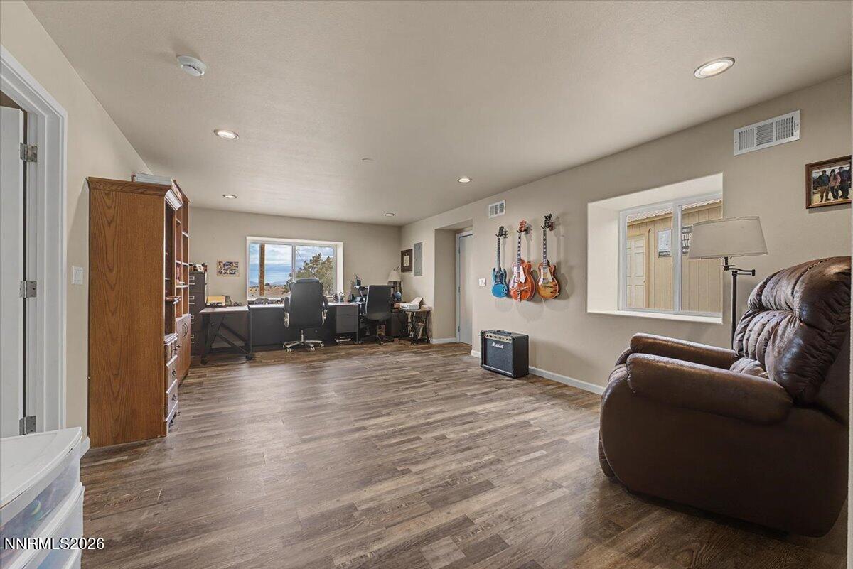 2300 Temple Hill Road Reno, NV 89521 - Photo 20 of 63 a living room with furniture and a wooden floor