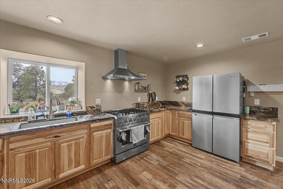 2300 Temple Hill Road Reno, NV 89521 - Photo 2 of 63 a kitchen with a stove a sink and a refrigerator