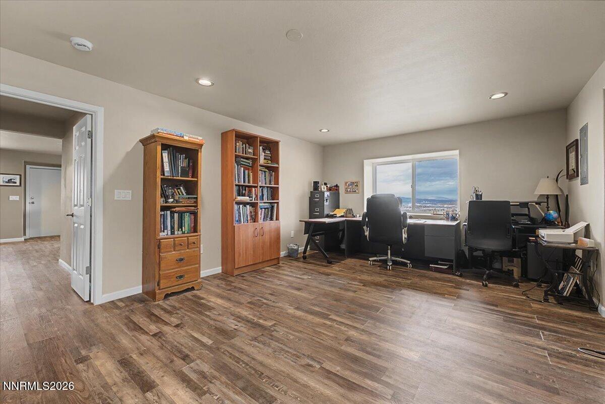 2300 Temple Hill Road Reno, NV 89521 - Photo 22 of 63 a view of a workspace with furniture and wooden floor