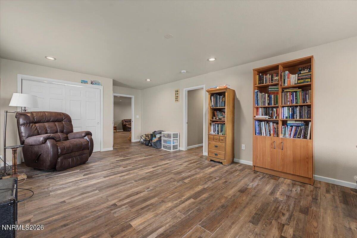 2300 Temple Hill Road Reno, NV 89521 - Photo 31 of 63 a living room with furniture and a book shelf
