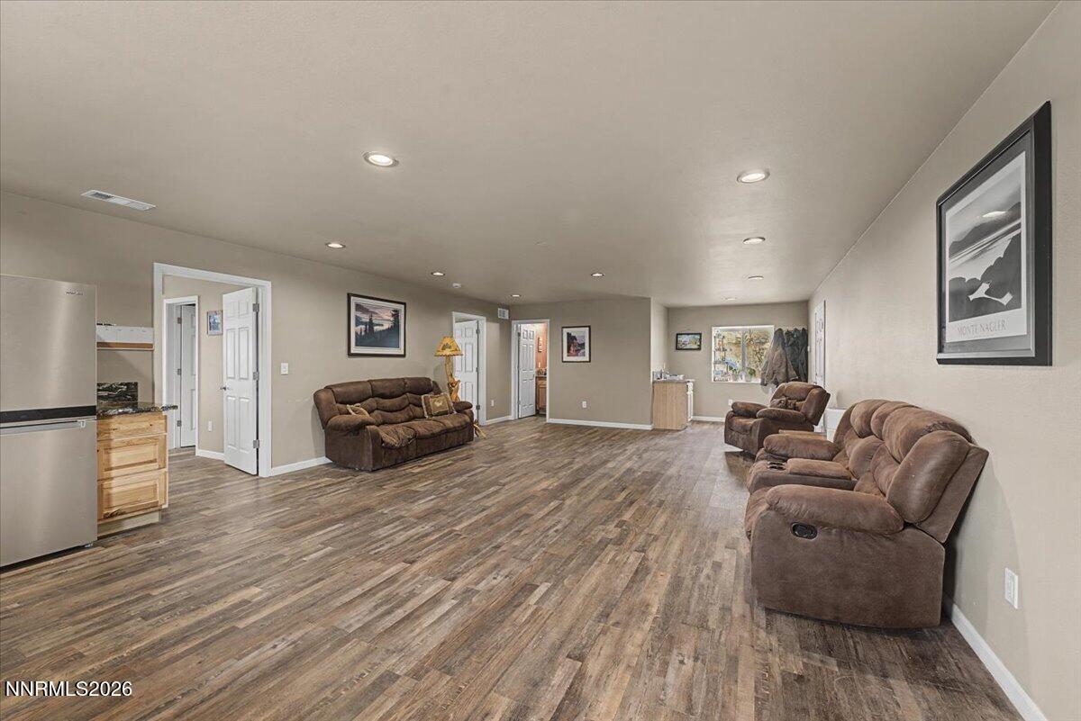 2300 Temple Hill Road Reno, NV 89521 - Photo 4 of 63 a living room with furniture and a wooden floor