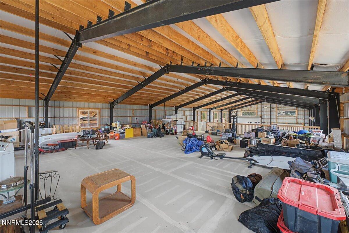 2300 Temple Hill Road Reno, NV 89521 - Photo 47 of 63 a view of a garage with a white car