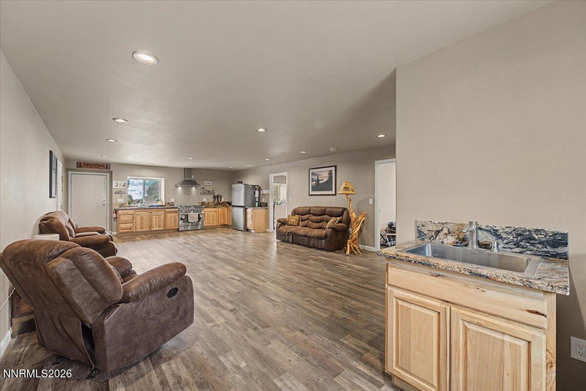 2300 Temple Hill Road Reno, NV 89521 - Photo 6 of 63 a living room with furniture and a wooden floor