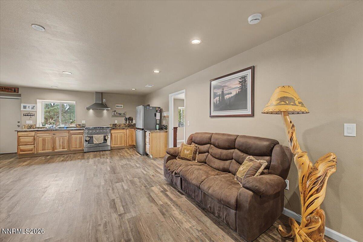 2300 Temple Hill Road Reno, NV 89521 - Photo 8 of 63 a living room with furniture and kitchen view