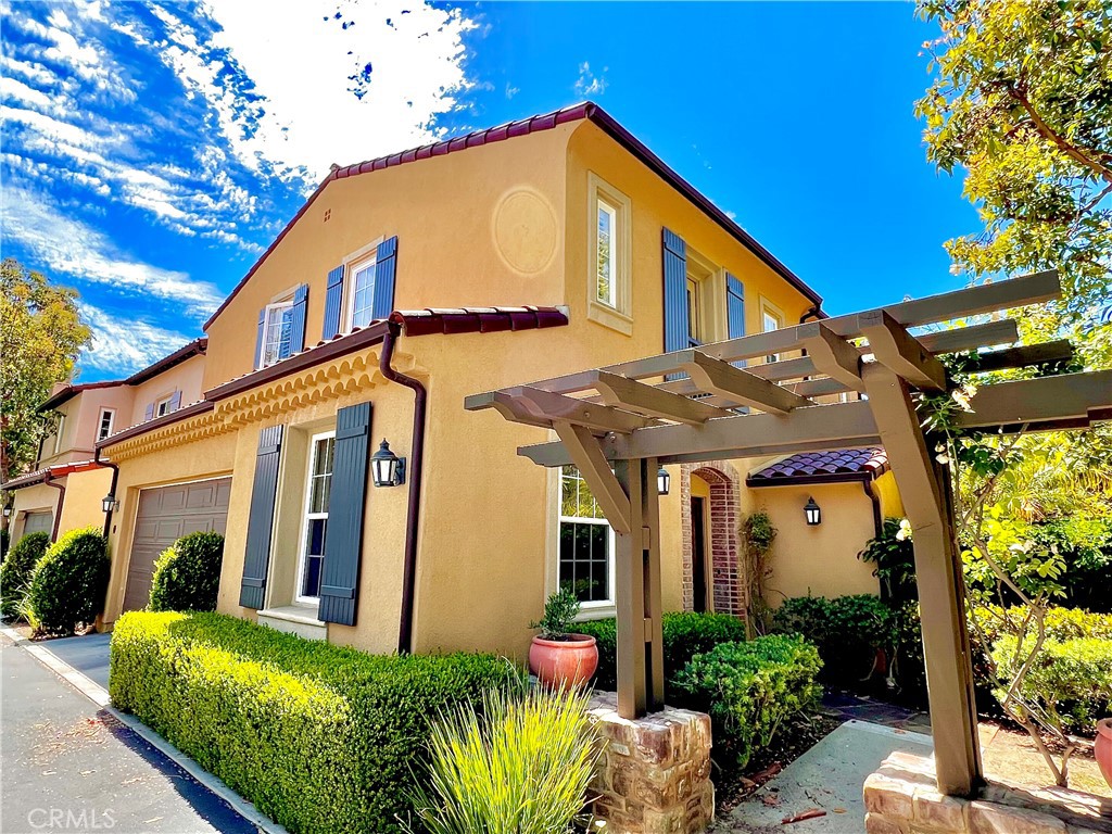 23 Gardenpath Irvine, CA 92603 - Photo 1 of 1 a front view of a house with a yard