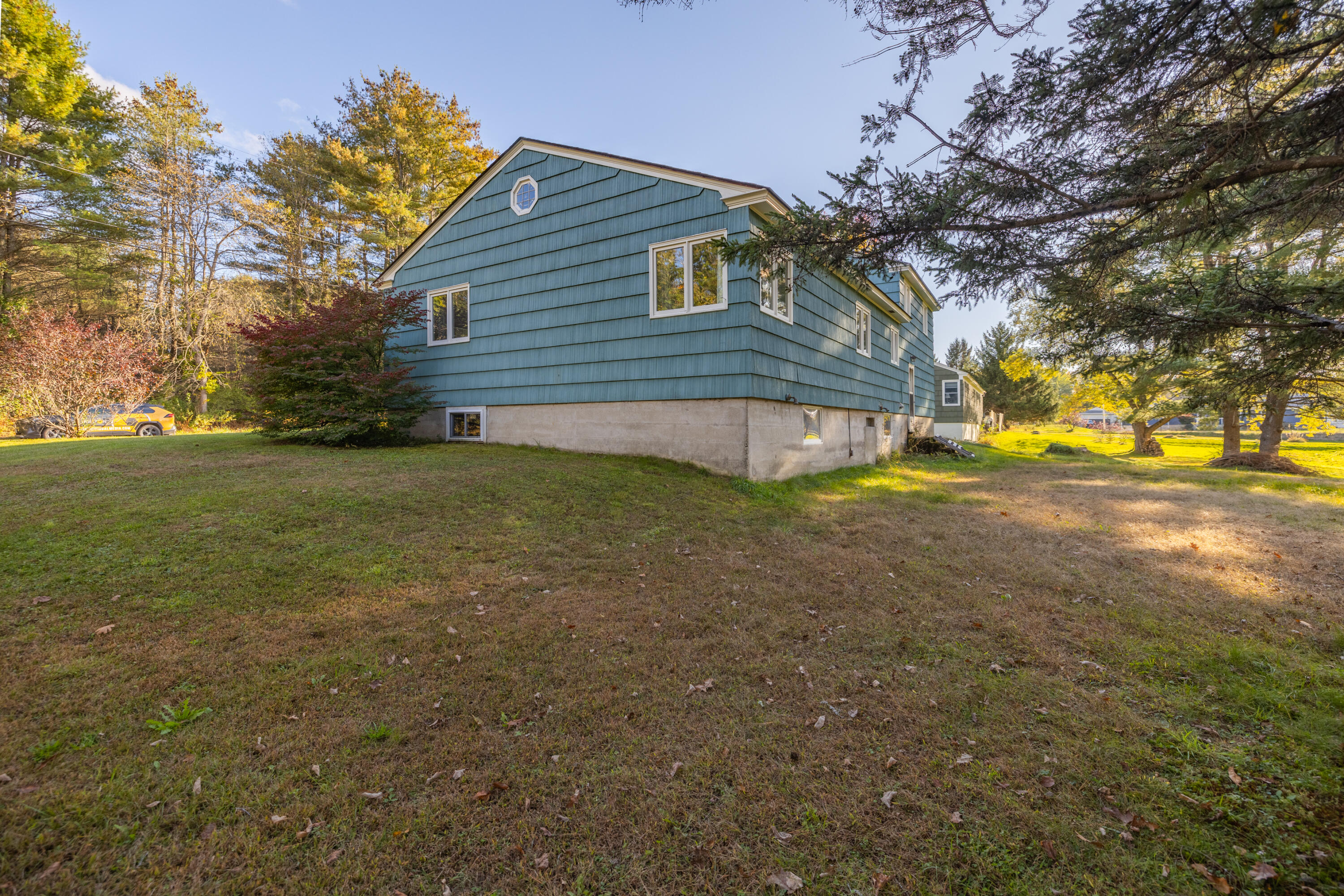 142 Hogan Road Lewiston, ME 04240 - Photo 4 of 36 Side Back View