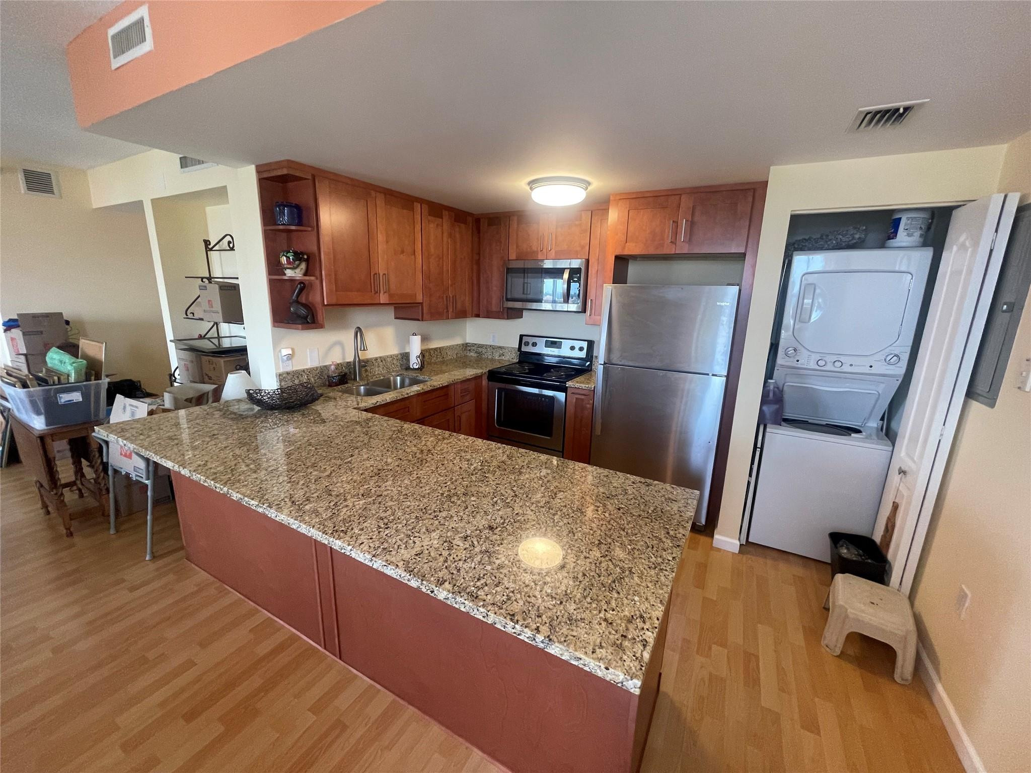 1627 Southwest 37th Avenue, Unit 701 Miami, FL 33145 - Photo 4 of 19 RENOVATED KITCHEN