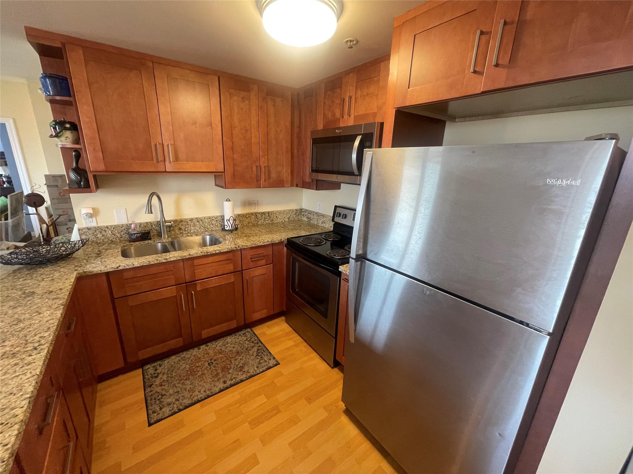 1627 Southwest 37th Avenue, Unit 701 Miami, FL 33145 - Photo 8 of 19 RENOVATED KITCHEN