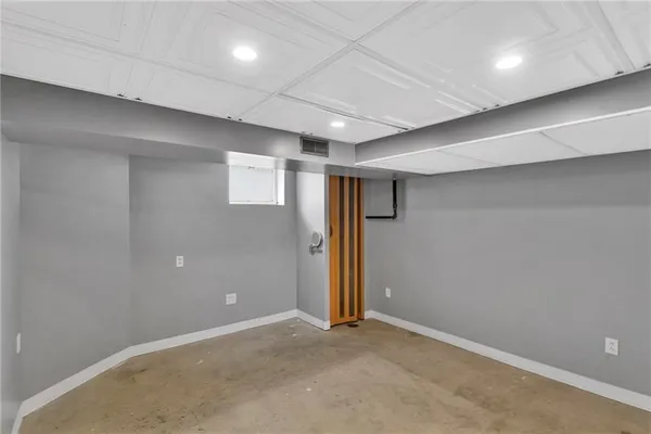 a utility room with cabinets