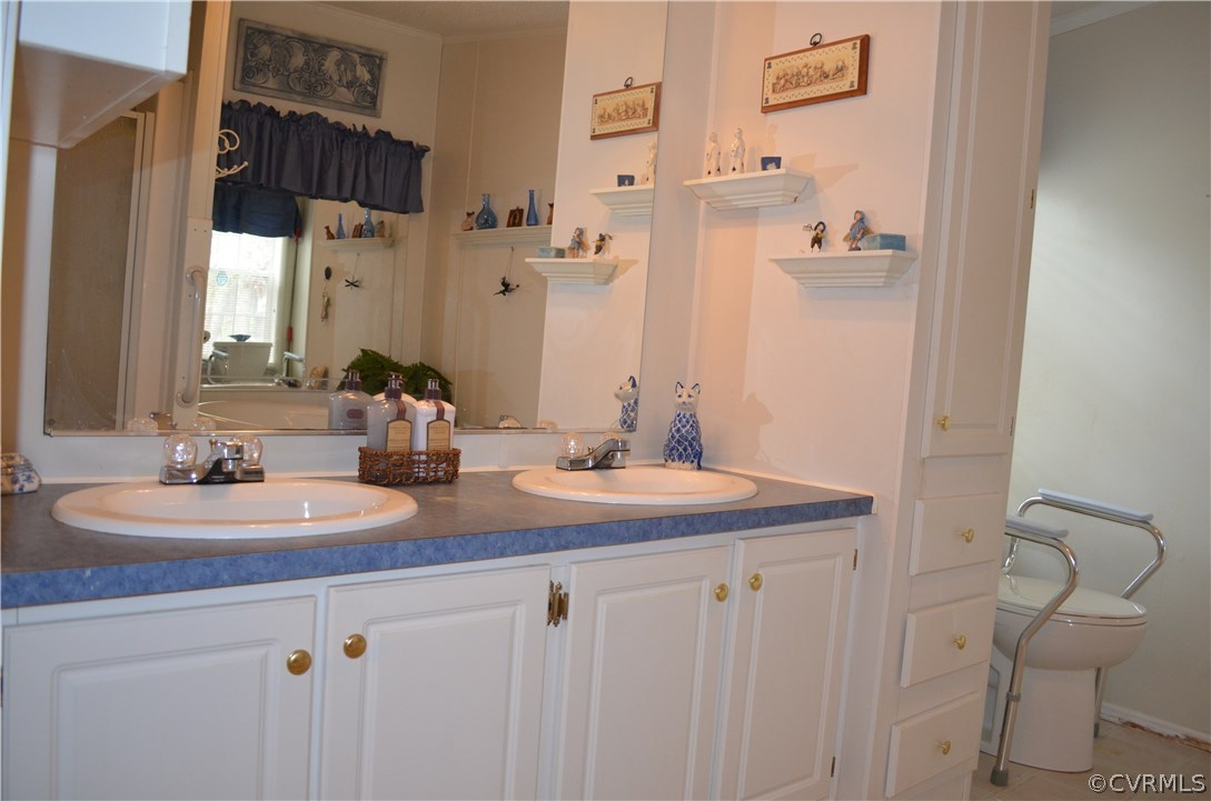 1370 Stavemill Road Powhatan, VA 23139 - Photo 14 of 34 master bath features double vanity, linen cabinet,