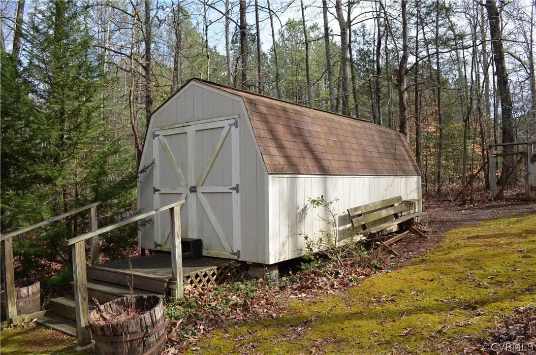 1370 Stavemill Road Powhatan, VA 23139 - Photo 21 of 34 storage shed with the manufactured home