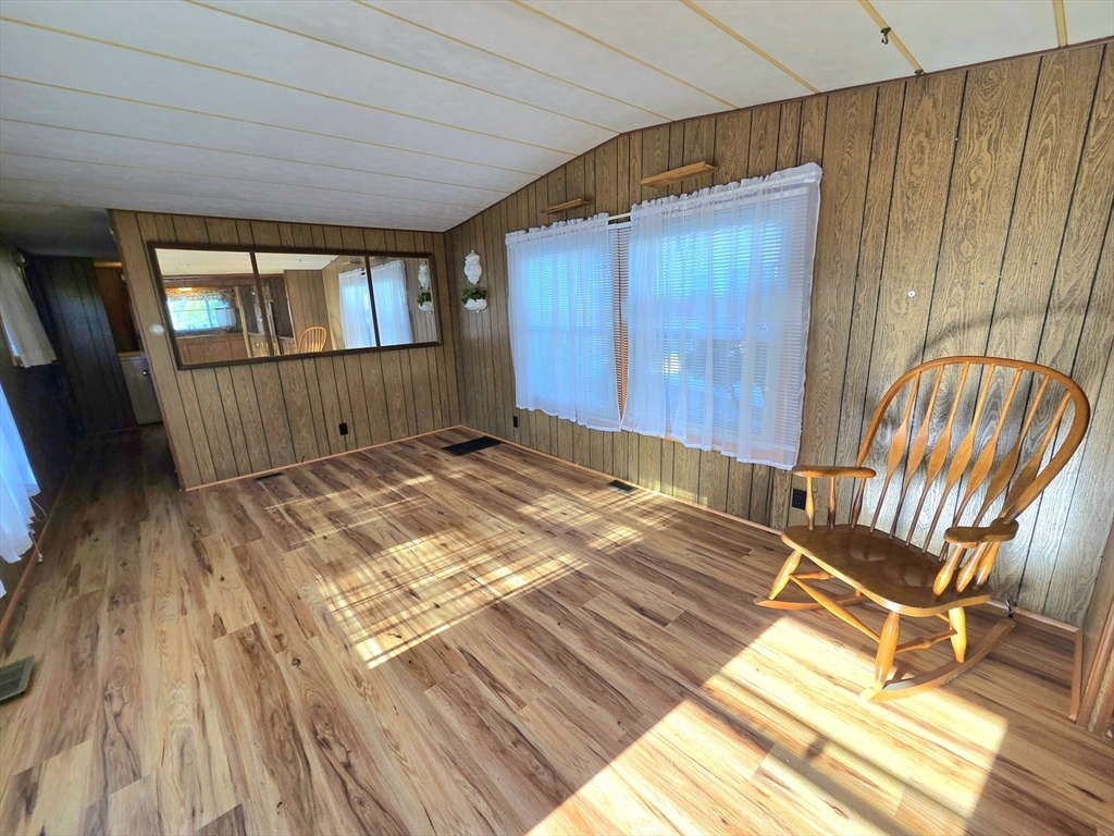 1760 Westover Road, Unit 2 Chicopee, MA 01020 - Photo 6 of 20 a bedroom with a bed and wooden floor