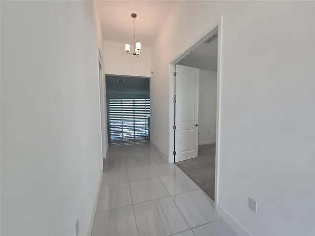 a view of a room with a fireplace