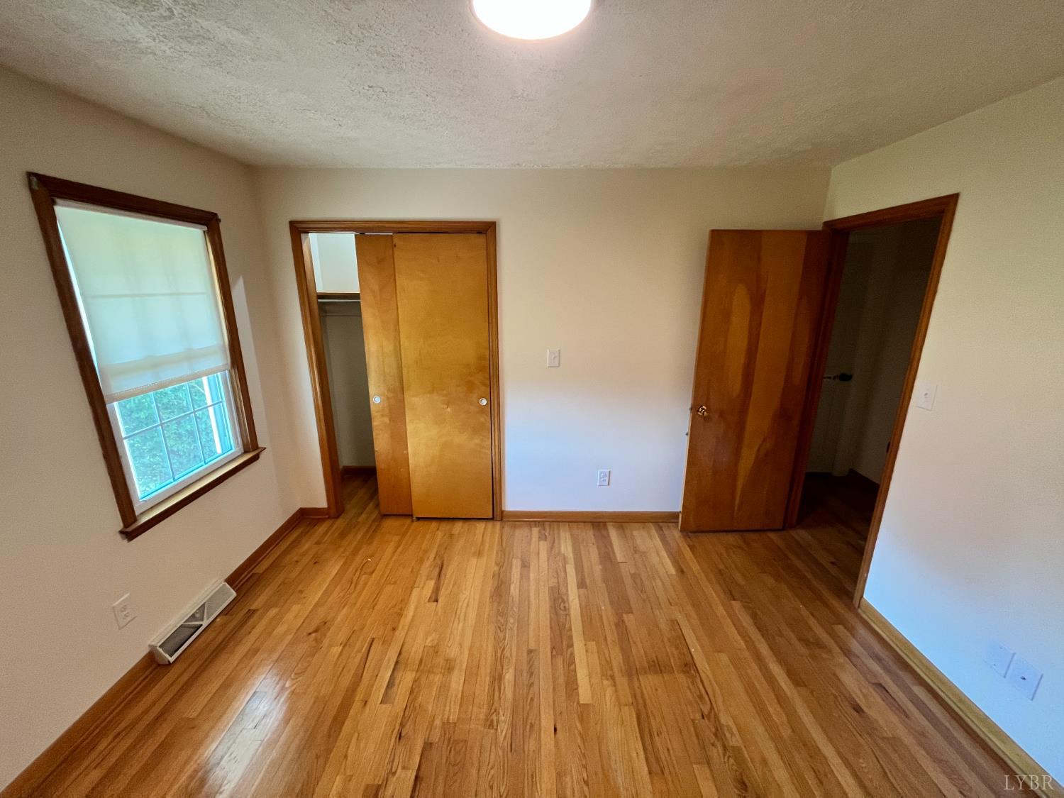 73 High View Place Lynchburg, VA 24502 - Photo 12 of 25 a view of livingroom with hardwood floor and front door