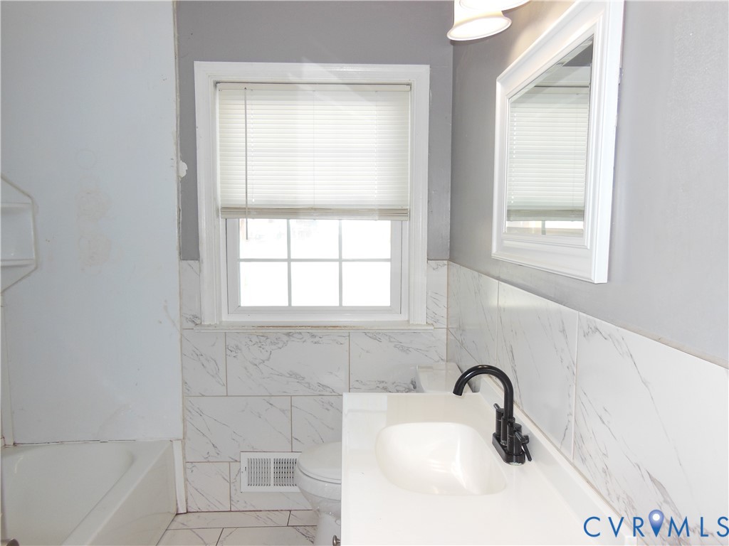 4321 Amberly Road Richmond, VA 23234 - Photo 20 of 21 Hall Bathroom