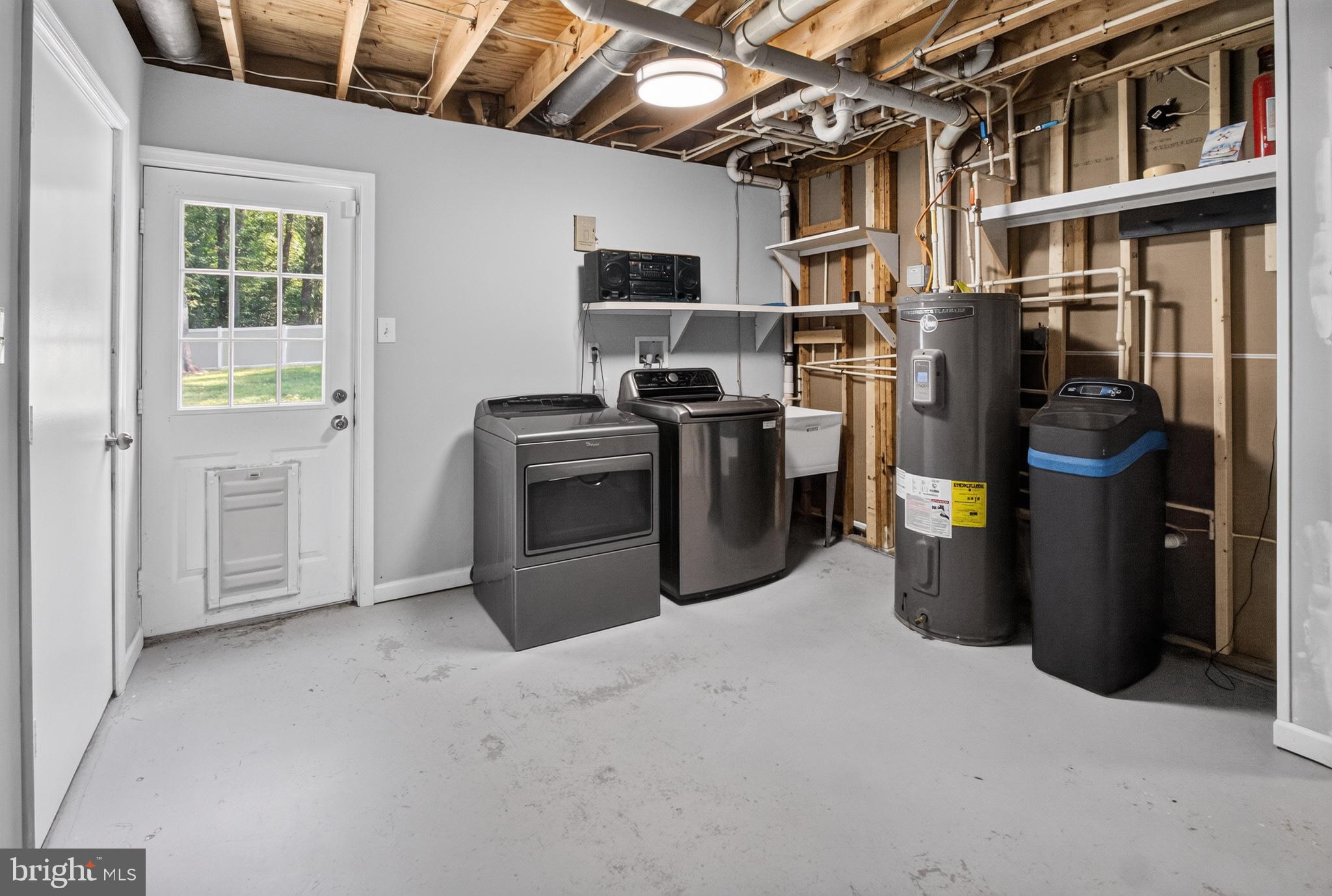 2816 Ridge Road Waldorf, MD 20603 - Photo 27 of 33 Spacious laundry area with natural light.