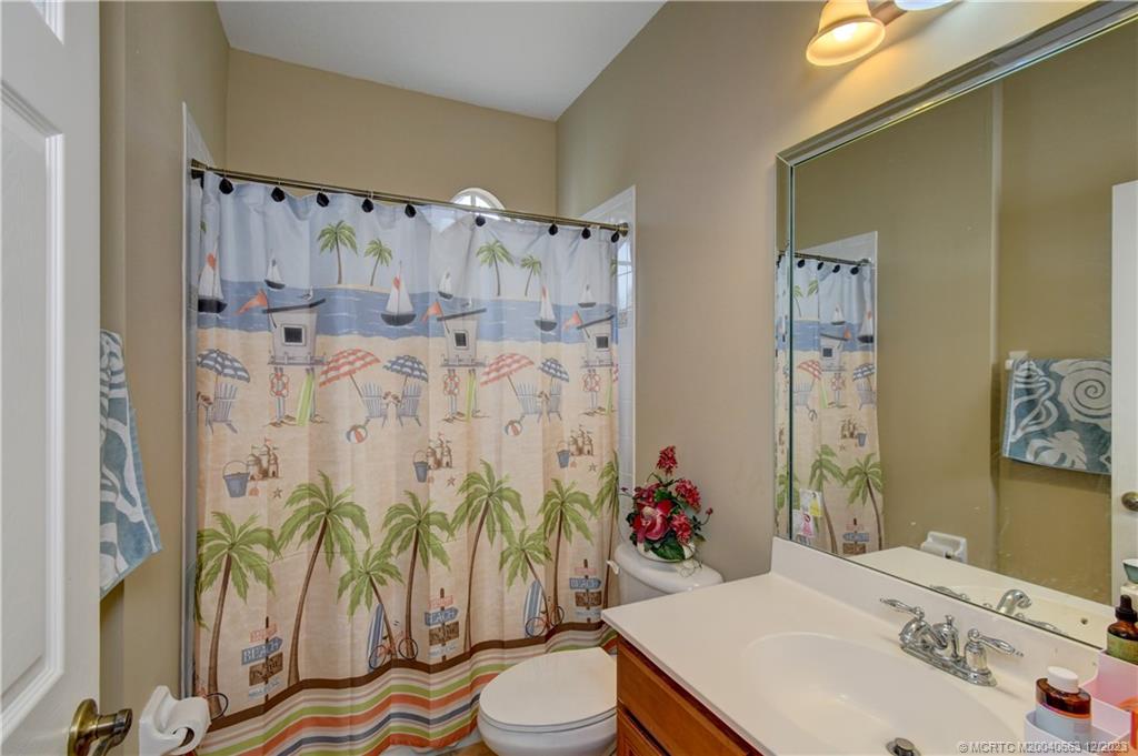 2171 Southwest Panther Trace Stuart, FL 34997 - Photo 5 of 26 1 of 2 full guest baths inside house