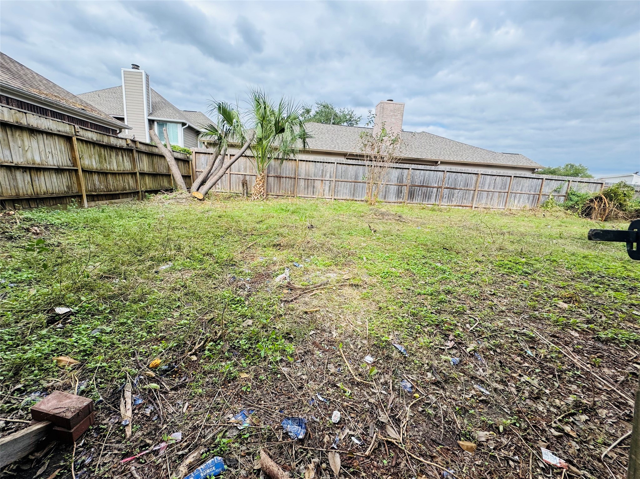 1533 Beaconshire Houston, TX 77077 - Photo 7 of 9 a view of a house with a backyard