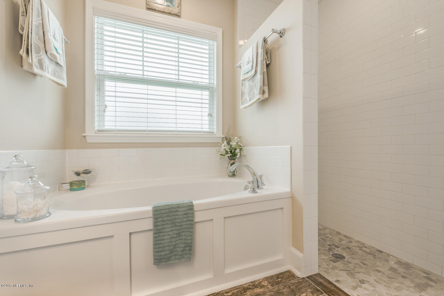 279 Basque Road St. Augustine, FL 32080 - Photo 10 of 29 a bathroom with a sink a toilet and a window