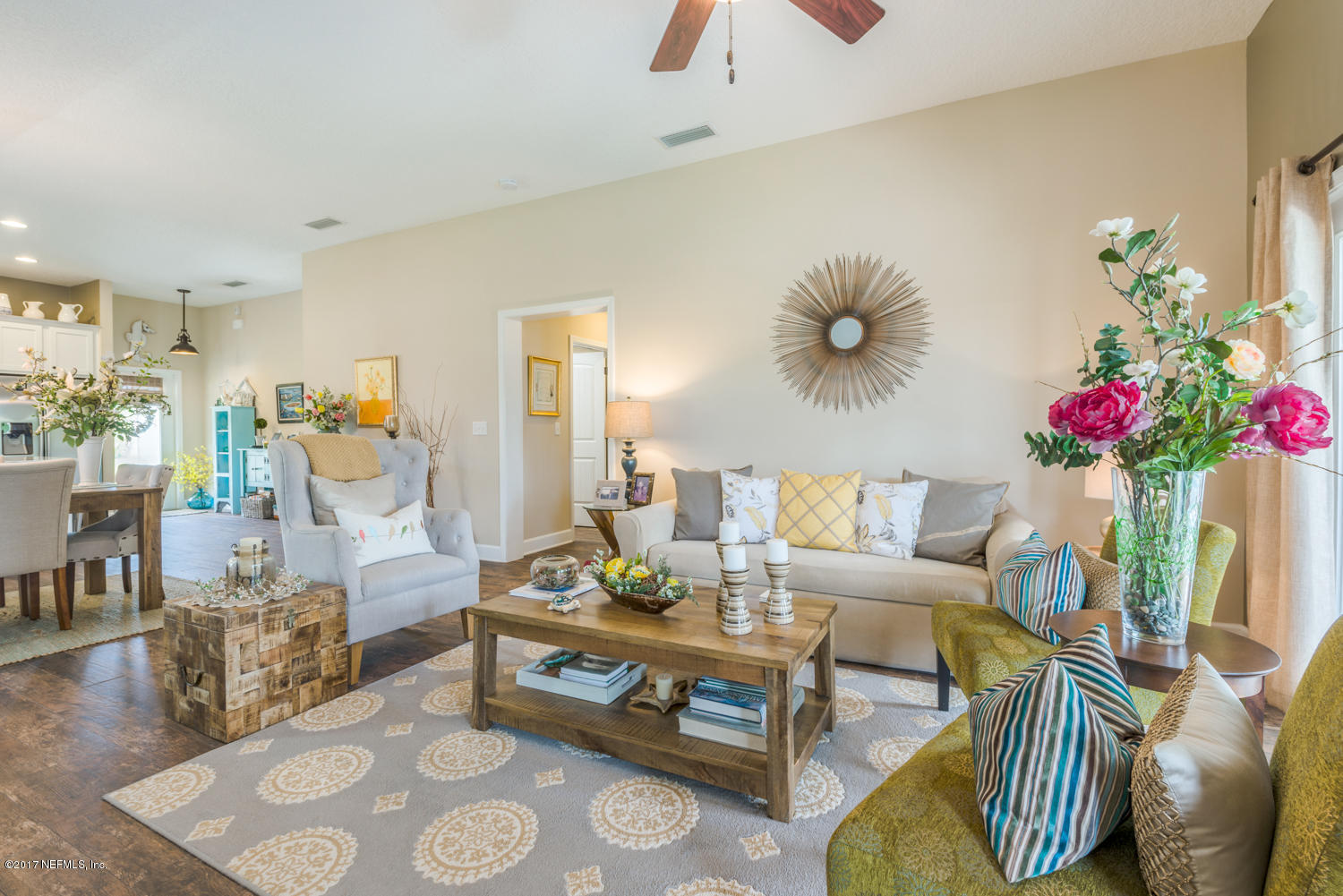 279 Basque Road St. Augustine, FL 32080 - Photo 7 of 29 a living room with furniture and flowers