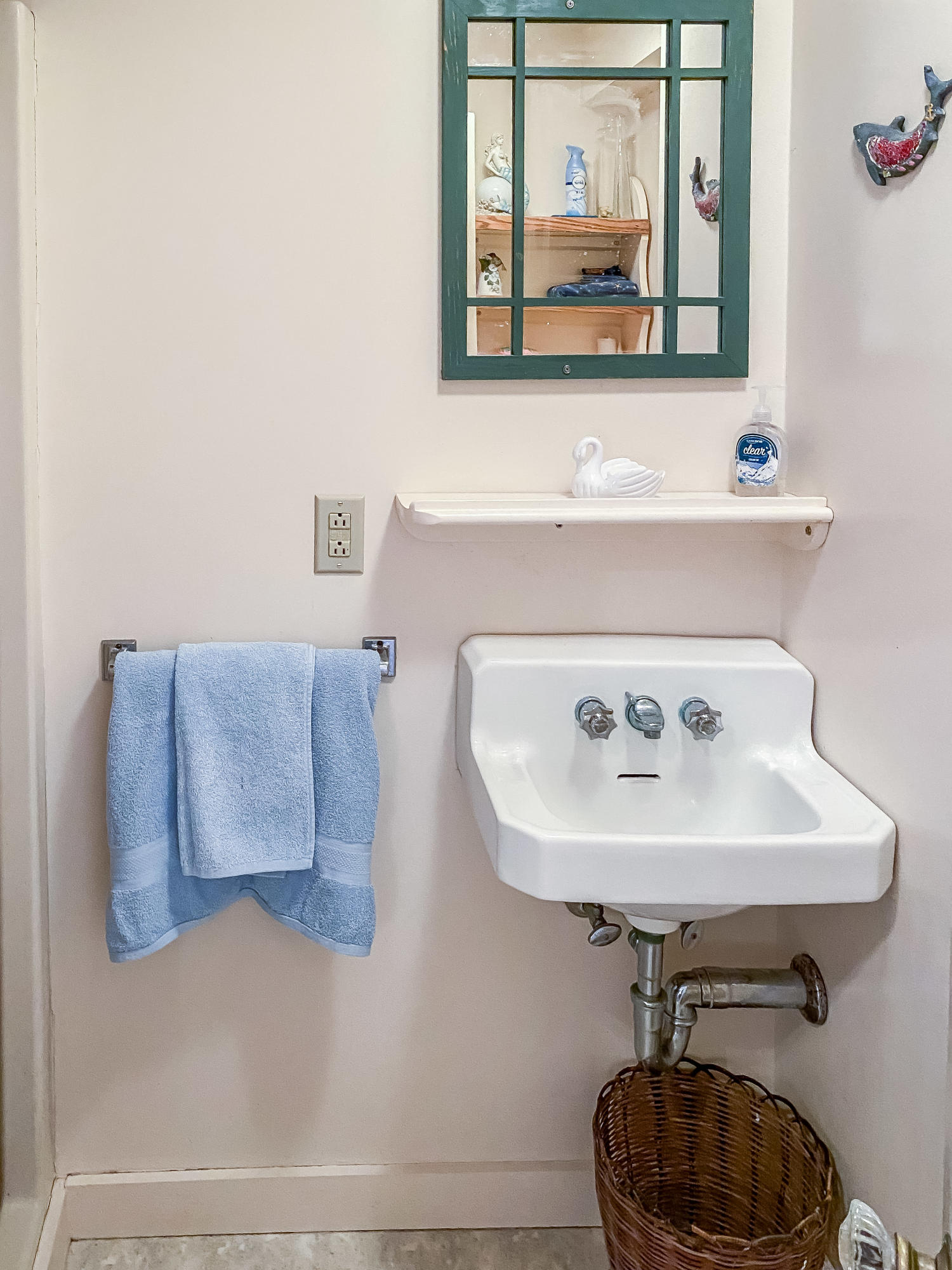 166 Katama Road Edgartown, MA 02539 - Photo 11 of 42 a bathroom with a sink and a mirror