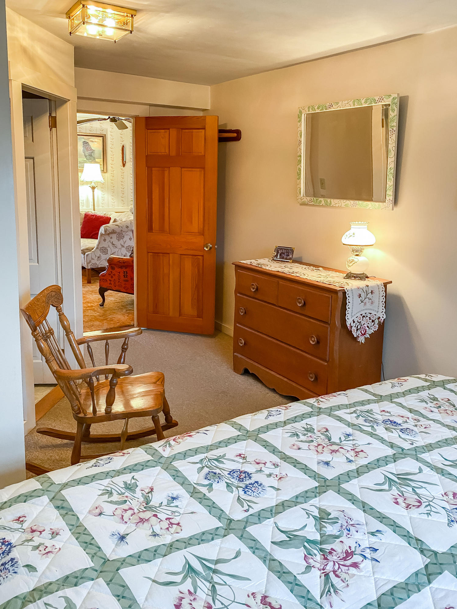 166 Katama Road Edgartown, MA 02539 - Photo 12 of 42 a bedroom with a bed and wooden floor