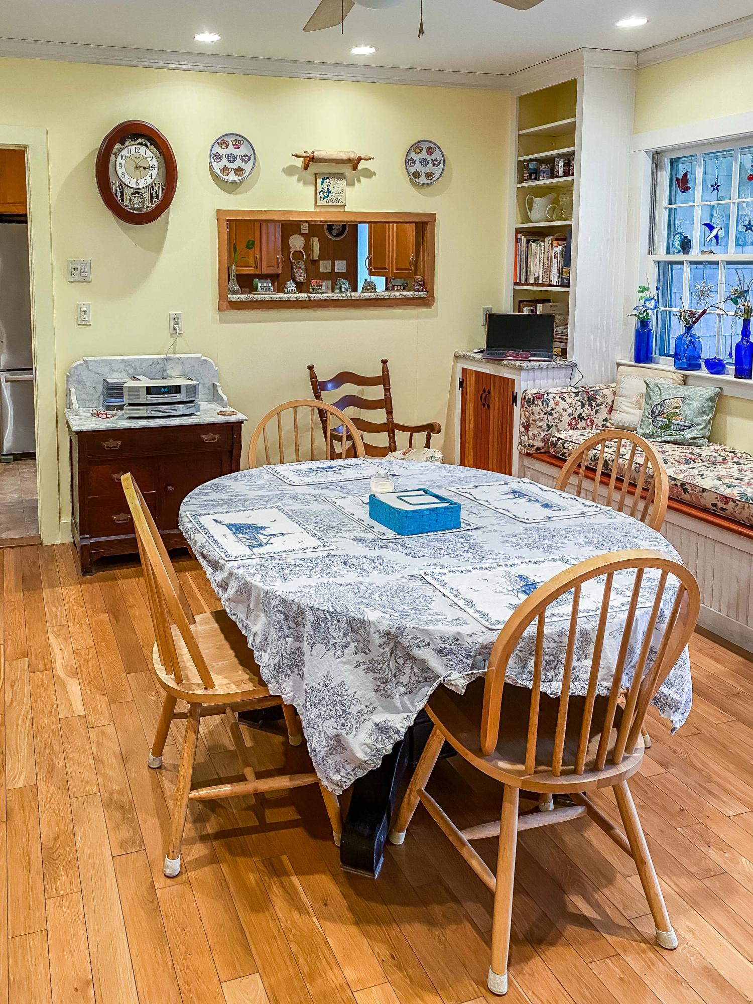 166 Katama Road Edgartown, MA 02539 - Photo 14 of 42 a dining room with wooden floor