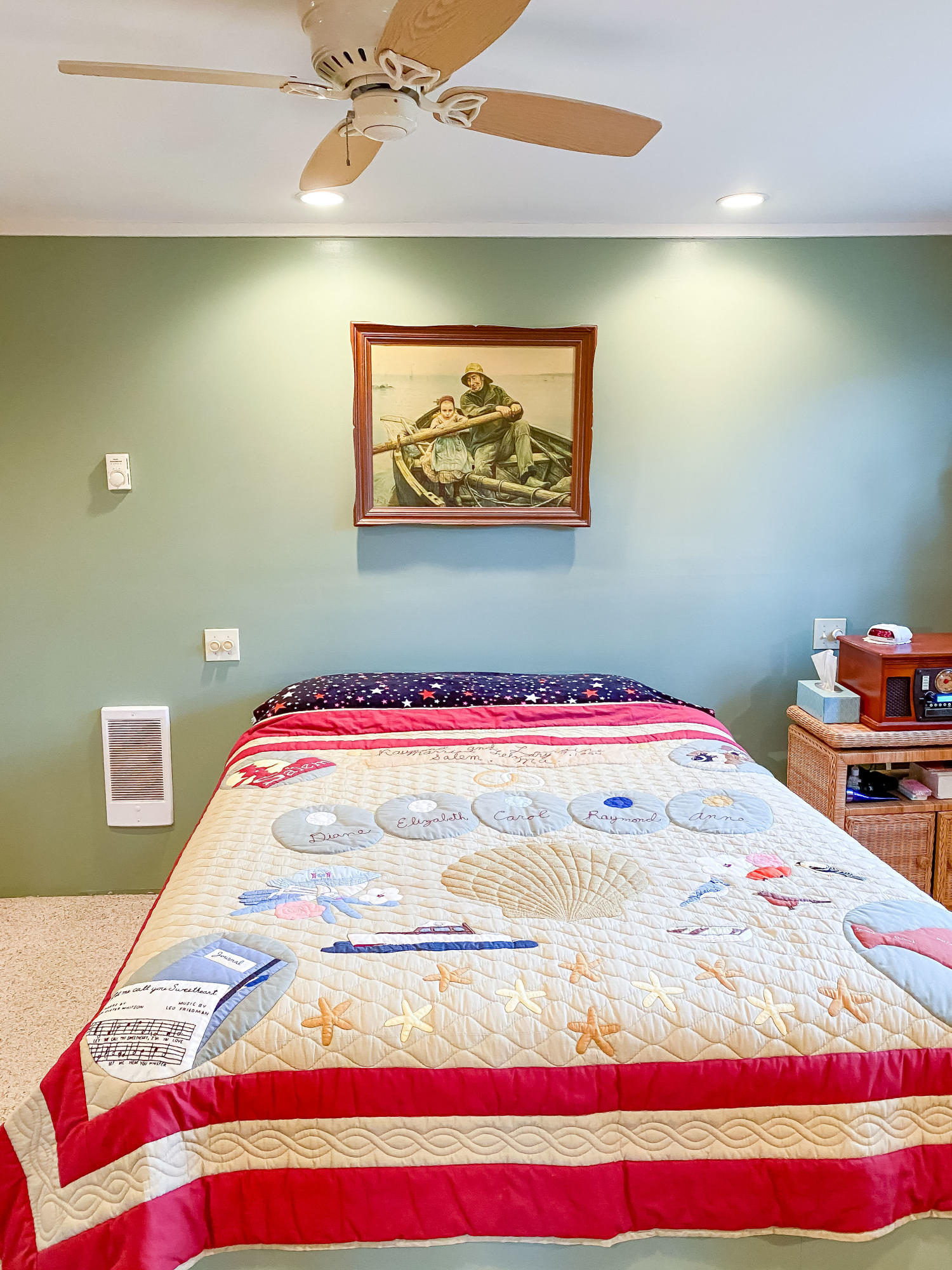166 Katama Road Edgartown, MA 02539 - Photo 27 of 42 a room with a bed and a painting on the wall