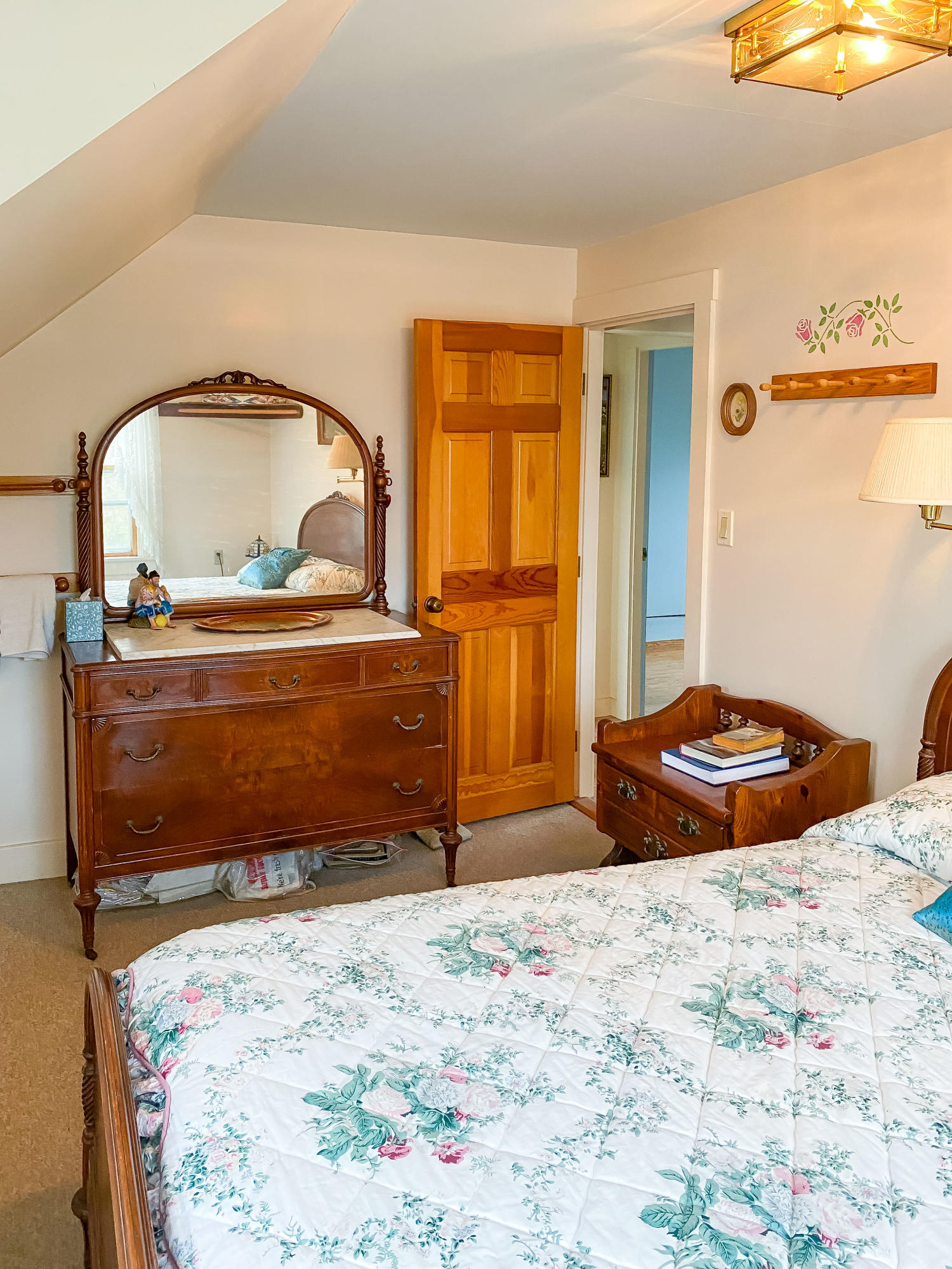 166 Katama Road Edgartown, MA 02539 - Photo 32 of 42 a bedroom with a bed and a mirror