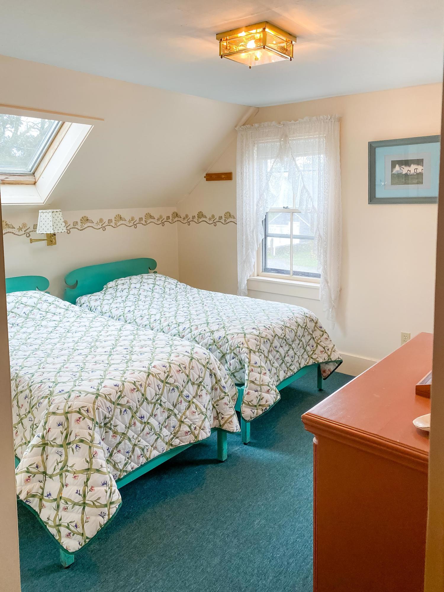 166 Katama Road Edgartown, MA 02539 - Photo 33 of 42 a bedroom with a bed and a window