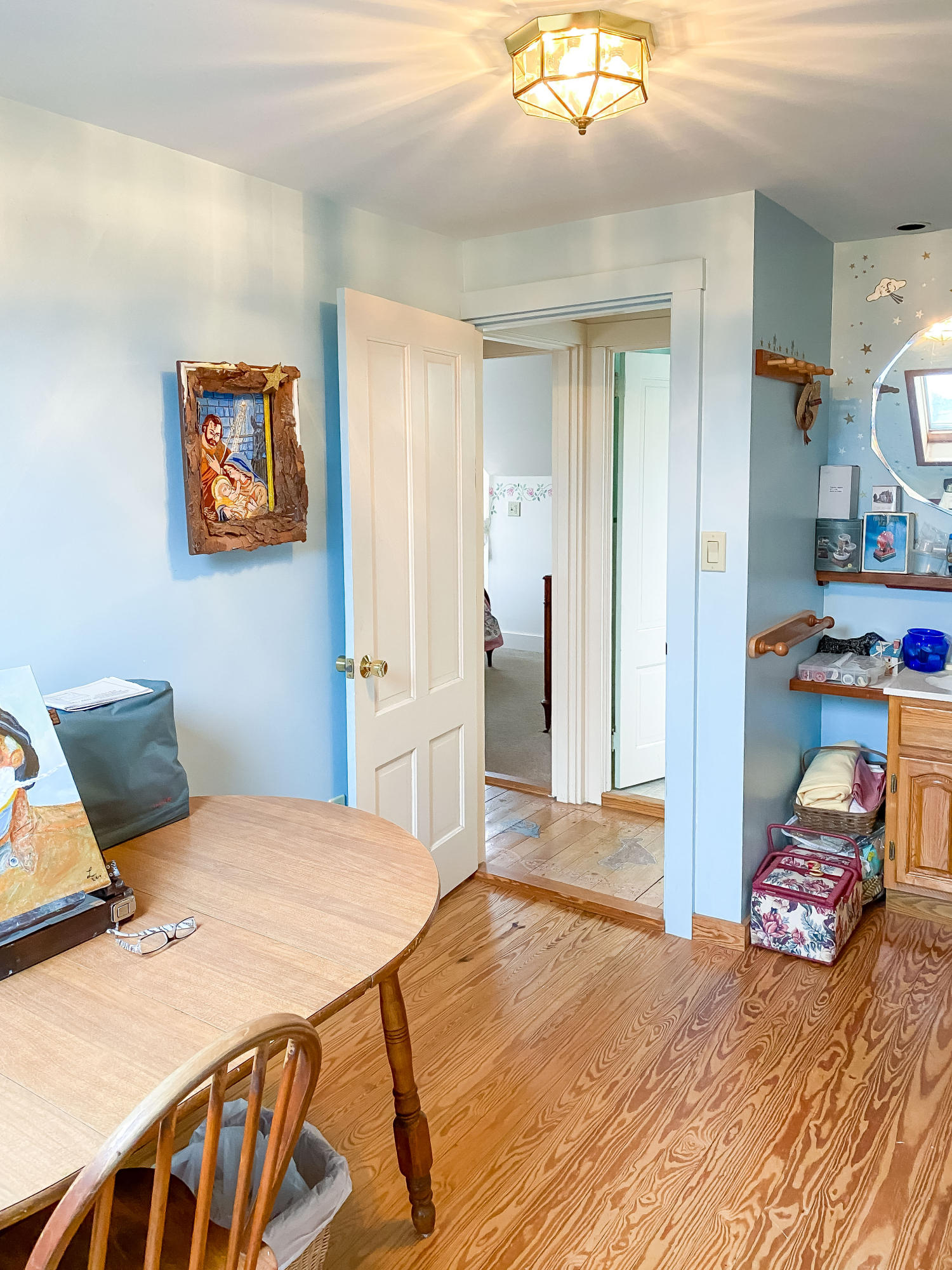 166 Katama Road Edgartown, MA 02539 - Photo 37 of 42 a bedroom with a bed and wooden floor