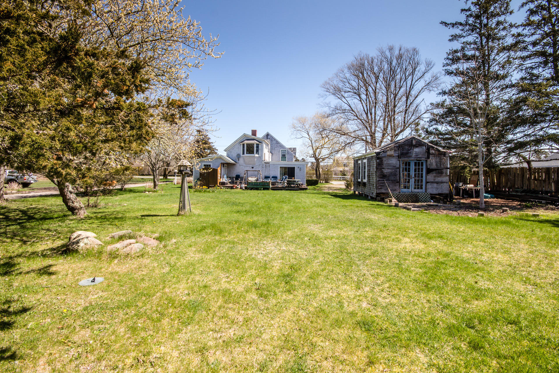 166 Katama Road Edgartown, MA 02539 - Photo 41 of 42 a view of a town with large trees