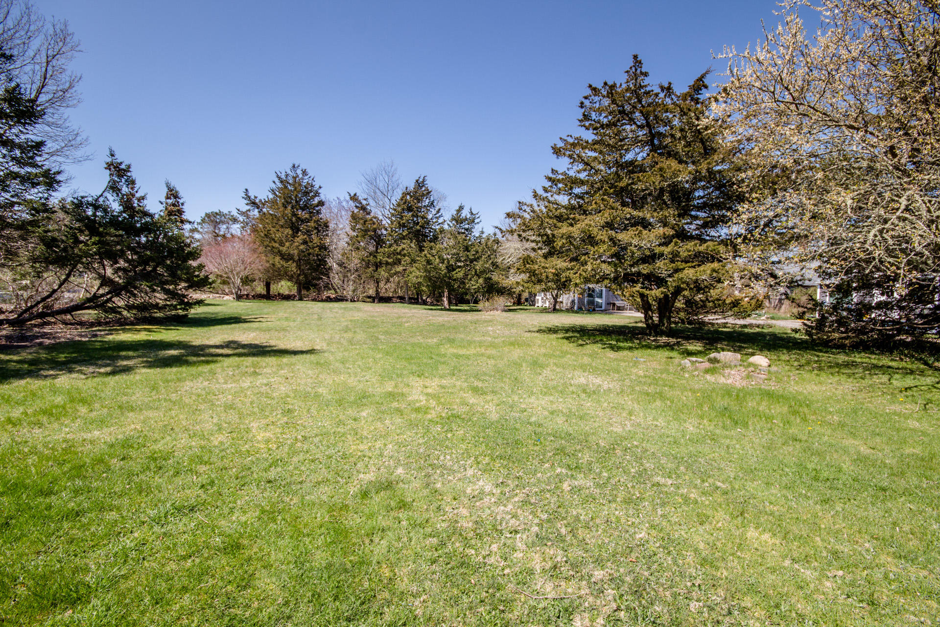 166 Katama Road Edgartown, MA 02539 - Photo 5 of 42 a view of outdoor space with trees all around