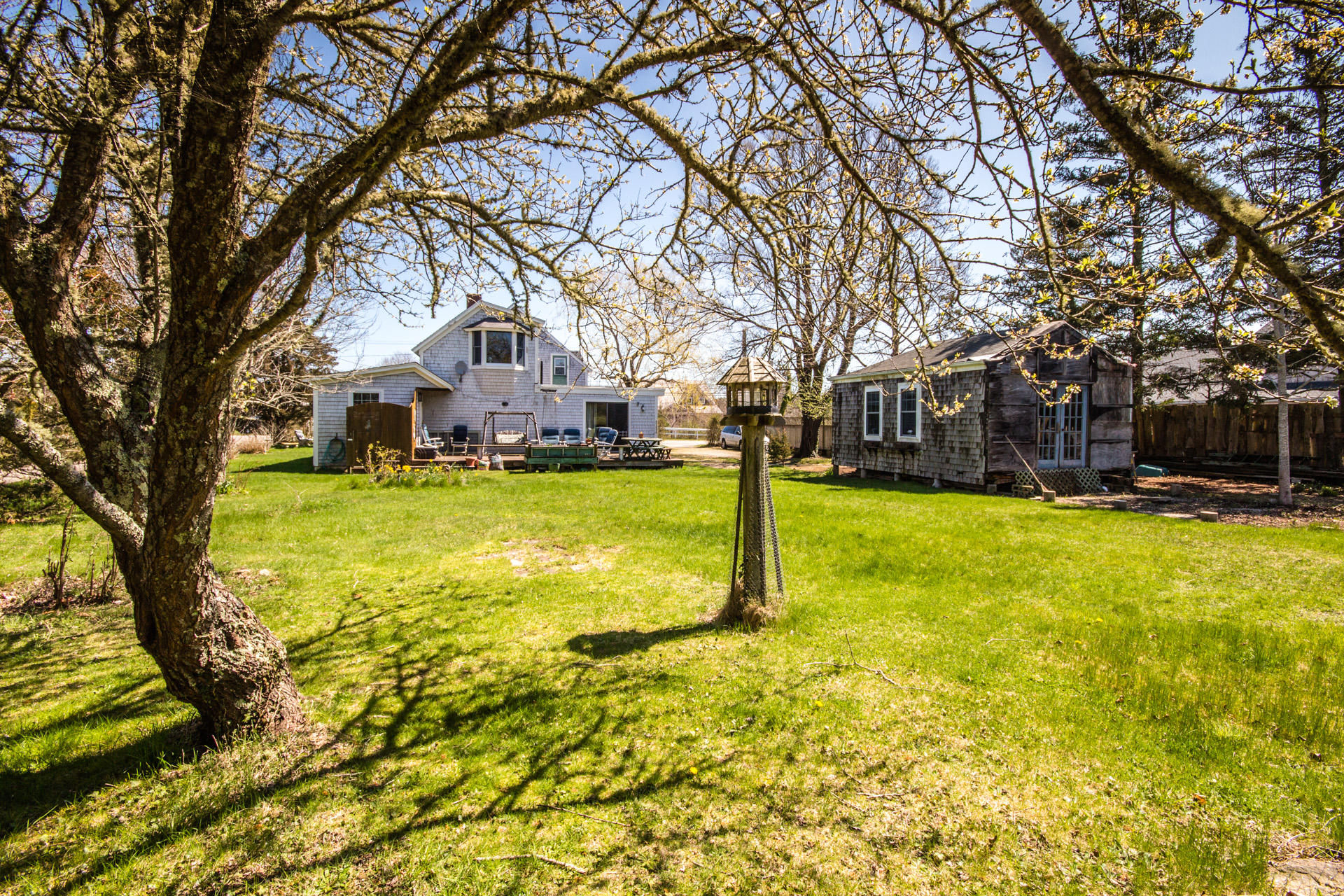 166 Katama Road Edgartown, MA 02539 - Photo 6 of 42 a house with swimming pool in front of it