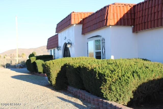 1201 East Old Stewart Road Willcox, AZ 85643 - Photo 43 of 49 a front view of a house with a yard