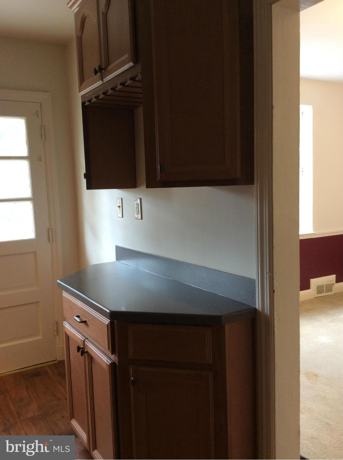 1423 Stonewood Road Baltimore, MD 21239 - Photo 6 of 29 a bathroom with a sink and a mirror