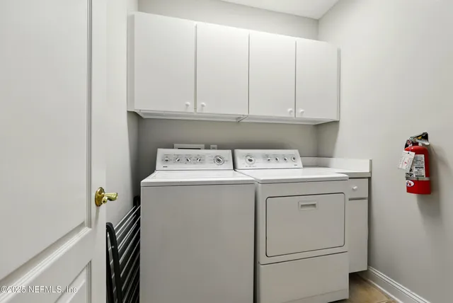 an aerial view of a house with swimming pool