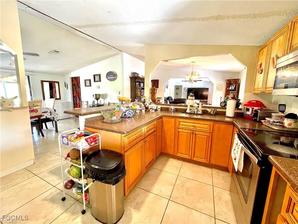 270 G Road LaBelle, FL 33935 - Photo 13 of 14 a kitchen with a sink and cabinets
