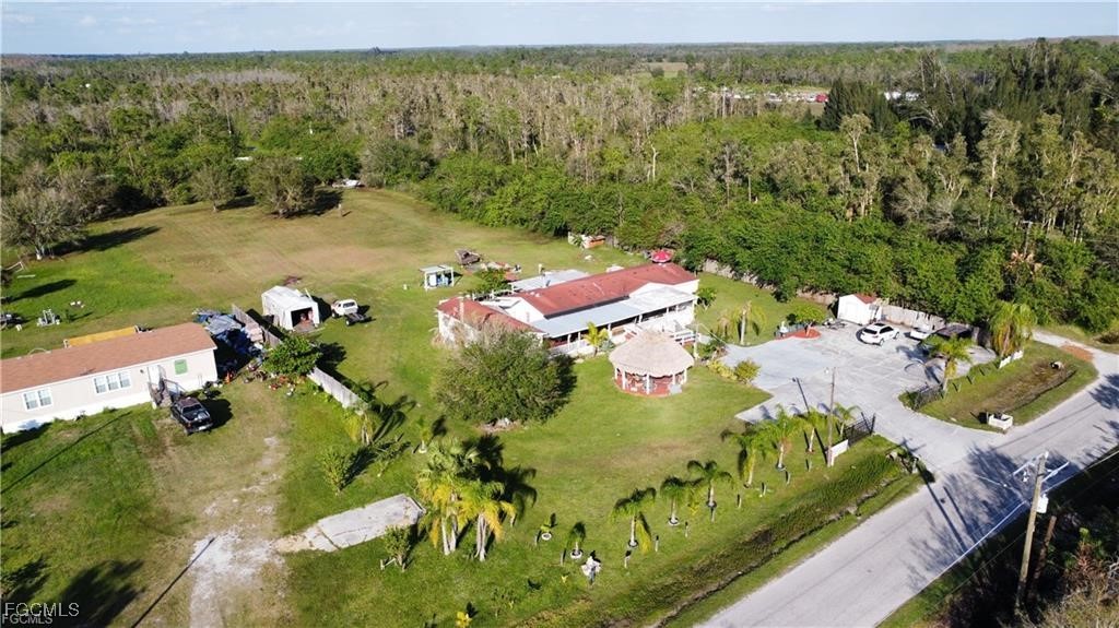 270 G Road LaBelle, FL 33935 - Photo 4 of 14 an aerial view of residential houses with outdoor space