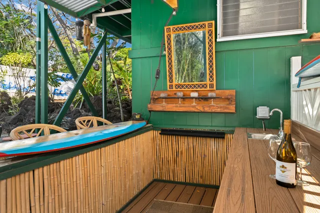 a patio with a yard table and chairs