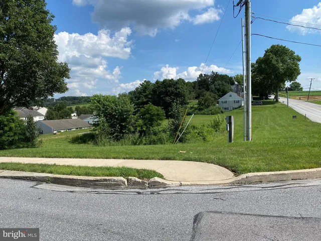 a view of a golf course with a park