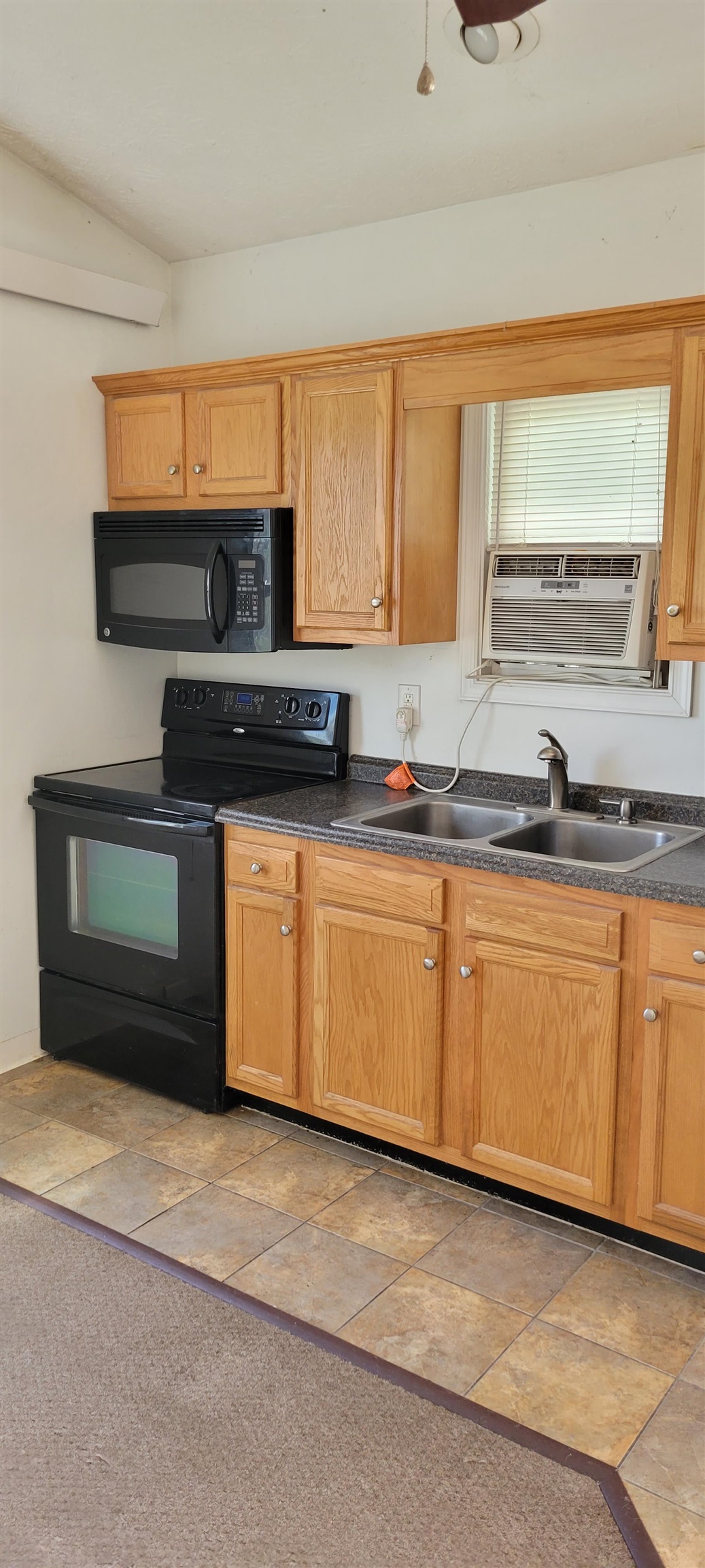 554 Middlebrook Road Staunton, VA 24401 - Photo 2 of 13 a kitchen with stainless steel appliances granite countertop a stove a sink and a microwave