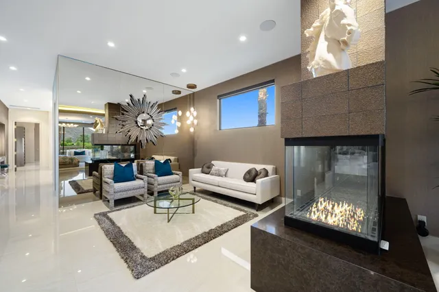 a bathroom with a sink a vanity and a shower
