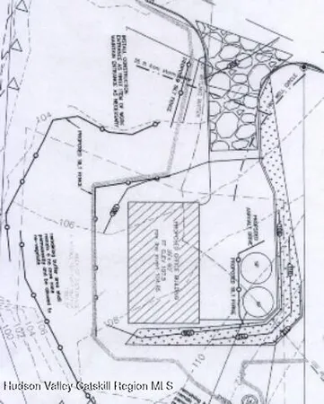 a blue sign that is on the side of the street