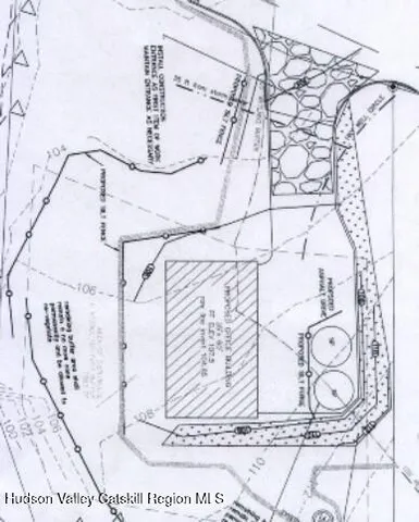 a blue sign that is on the side of the street