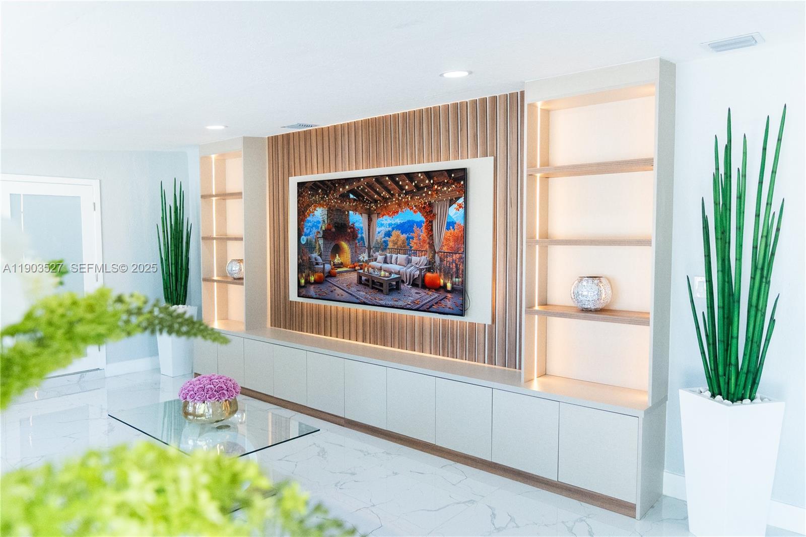 19245 Southwest 188th Street Miami, FL 33187 - Photo 14 of 38 a view of a hallway with two large windows and a flower pot