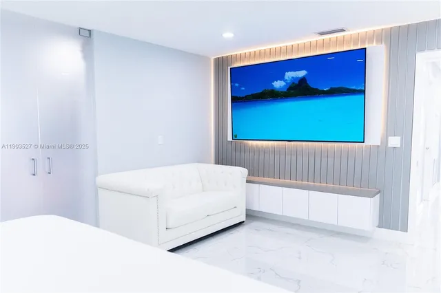 a bed room with a bed and a window